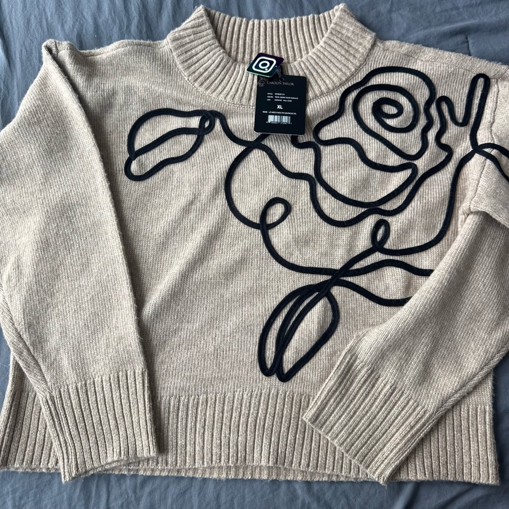 Beige Sweater with Black Floral Design